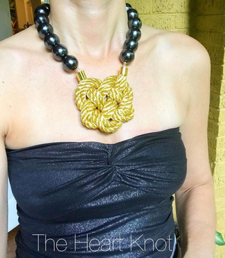 The Heartknot Double Gold On Black Cotton Pearls